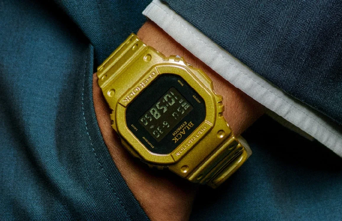 Casio DW-5600BEP-9 G-Shock gold watch with BlackEyePatch branding