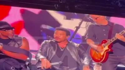 Lionel Richie Hospitalized After Falling Ill Onstage During Concert